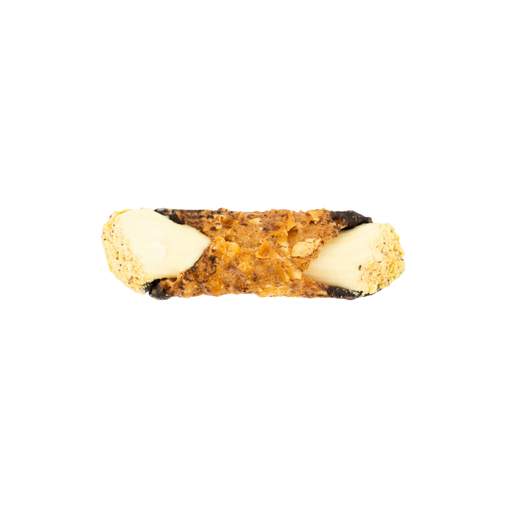 Close up of gluten free almond brittle cannoli shell filled with white chocolate cream