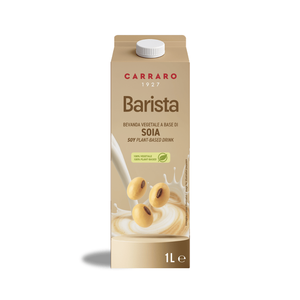 A 1-liter carton of Carraro 1927 Barista Soy plant-based milk, featuring soybeans splashing into creamy milk.