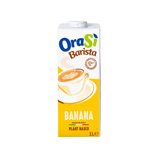 A 1-liter carton of OraSi Barista Banana plant-based milk, featuring a bright yellow design and an illustration of a frothy coffee.