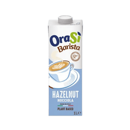 A 1-liter carton of OraSi Barista Hazelnut plant-based milk, featuring a light blue design with a frothy coffee.