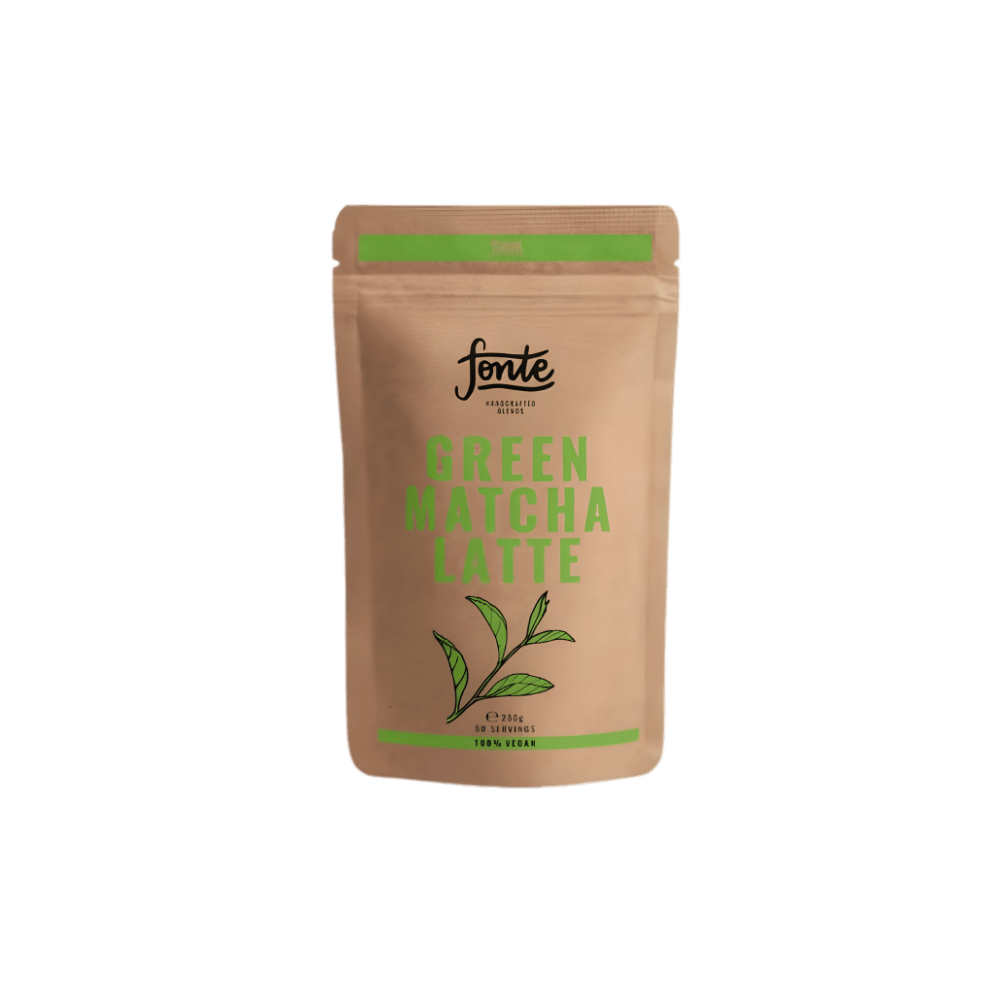 A detailed product shot of a resealable kraft paper pouch containing Fonte Green Matcha Latte (250g). The pouch features a green resealable top, the 'fonte' brand name, the text 'GREEN MATCHA LATTE', '250G', '50 SERVINGS', and '100% VEGAN', along with a detailed illustration of a green tea leaf. The pouch stands against a plain white background.